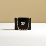 Chanel: a Black Velvet Bijoux Mini Flap Bag 1991-94 (includes authenticity card and dust bag but ...