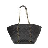 Chanel: a Large Black Quilted Lambskin Shoulder Tote 1989-91 (includes serial sticker and dust bag)