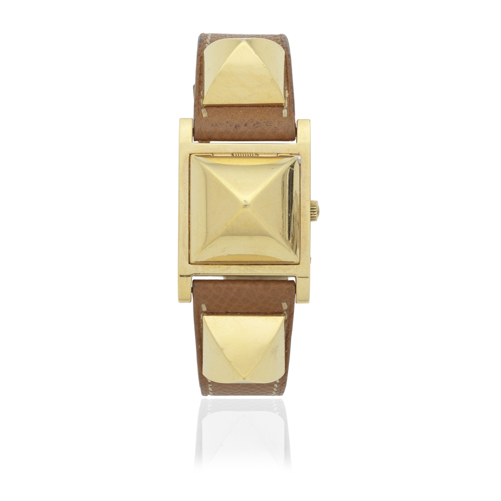 Herm&#232;s: a Gold Courchevel Leather Medor Watch 1995