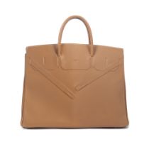 Herm&#232;s: a Gold Swift Leather Shadow Birkin 40 Limited Edition 2009 (includes rain jacket and...