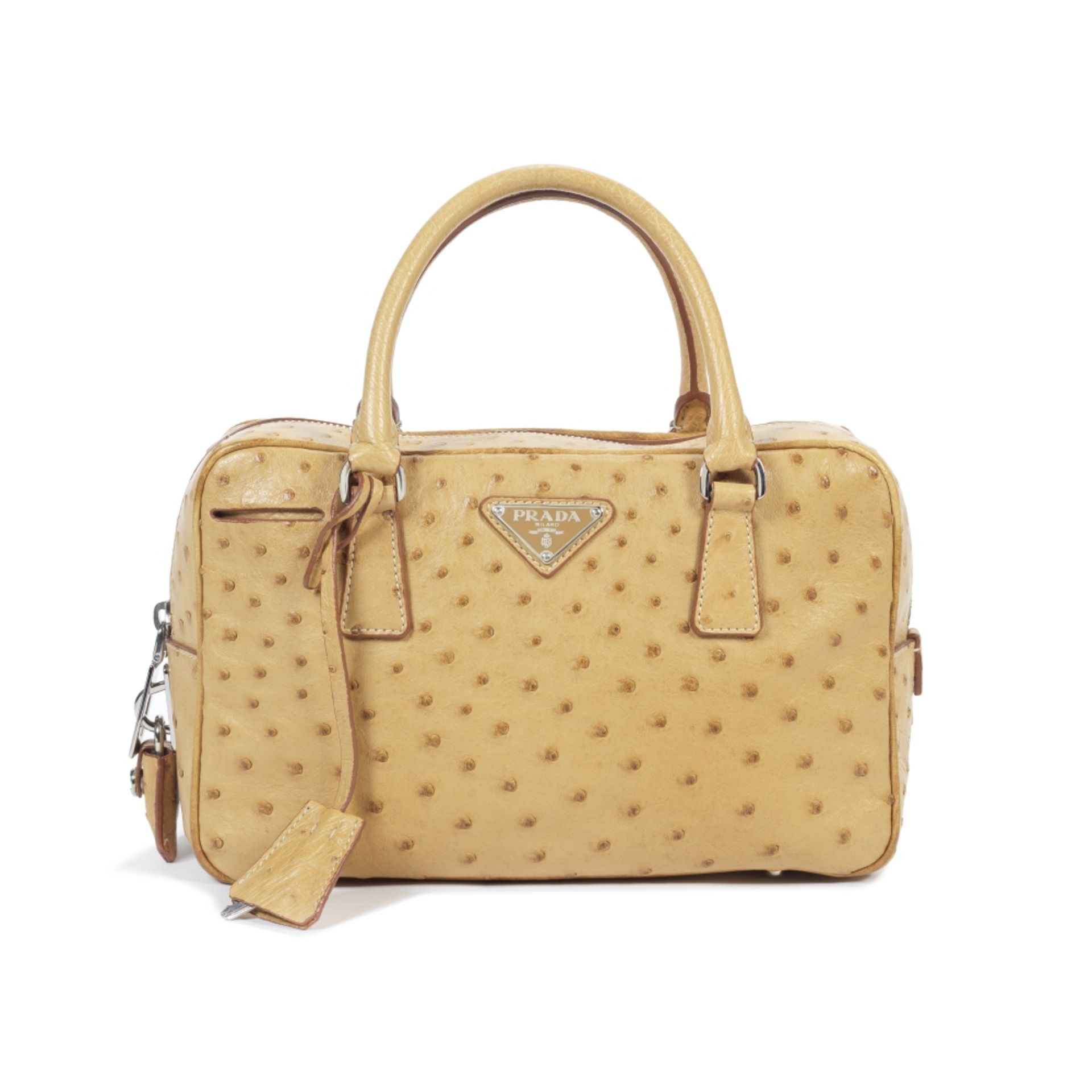 Prada: a Honey Ostrich Small Bauletto Bag (includes padlock, keys, cloche and dust bag)