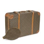 Louis Vuitton: a Monogram Stratos 80 Suitcase and Tennis Racket Cover 1970s