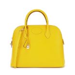 Herm&#232;s: a Jaune Ambre Epsom Leather Bolide 35 1994 (includes padlock, keys, cloche, and shou...