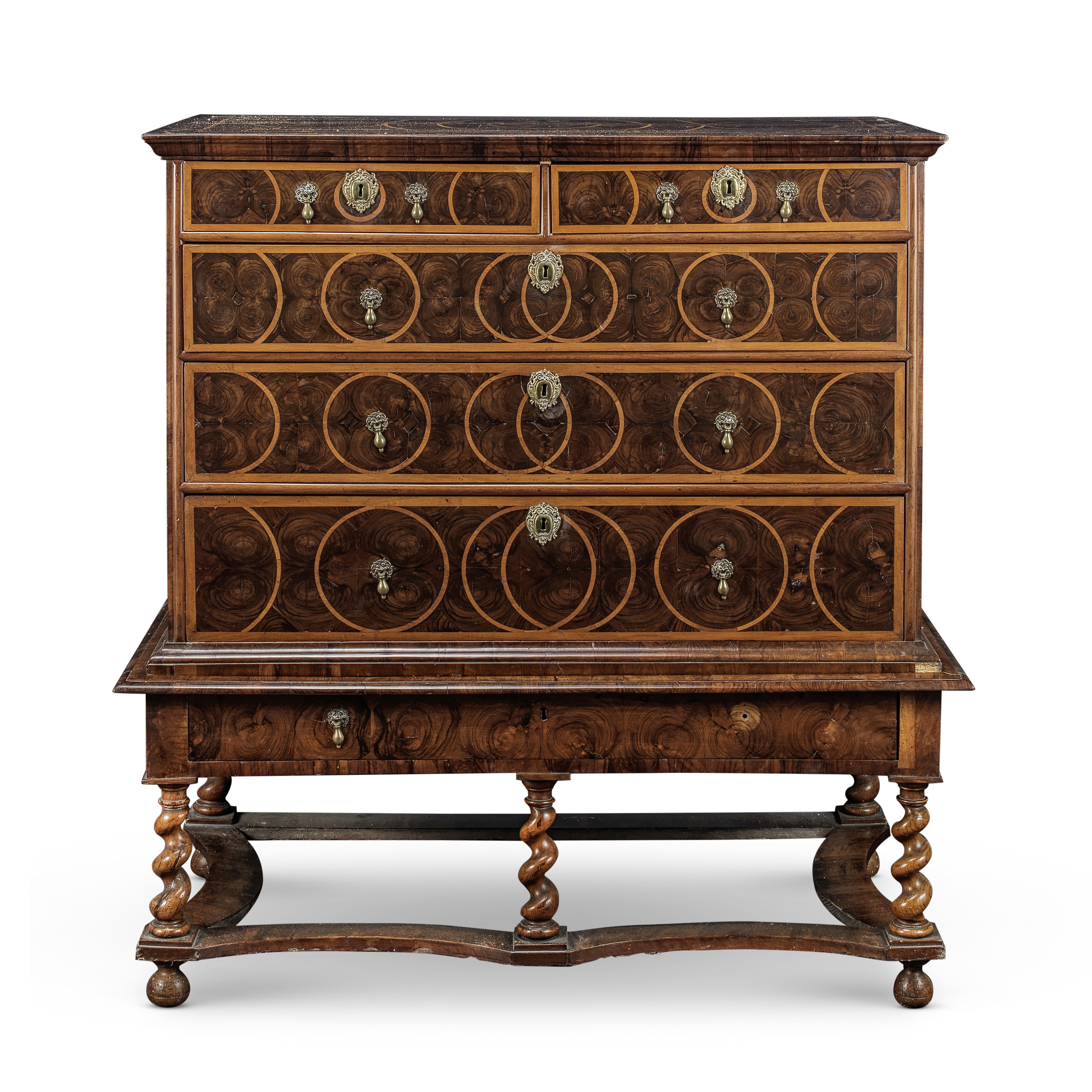 A late 17th century walnut, fruitwood and oyster veneered chest on stand