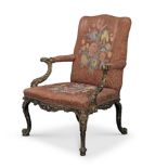 A George II carved giltwood and gesso Gainsborough type armchair Possibly attributable to Paul Sa...