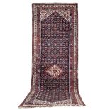 A large Feraghan runner West Persia 608cm x 209cm (239in x 82in)