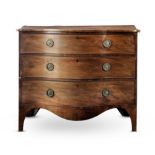 A late George III mahogany serpentine chest