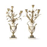 A pair of white marble and gilt metal mounted three branch candlesticks 19th century (2)