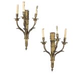A pair of French 19th century gilt brass three branch wall lights In the Louis XVI style (2)