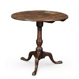 A George II oak and mahogany tripod table