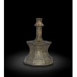 A very fine Fars gold and silver-inlaid bronze candlestick base South-West Persia, late 13th/ ear...