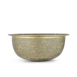 A large Mamluk engraved brass basin Egypt or Syria, late 15th/ early 16th Century