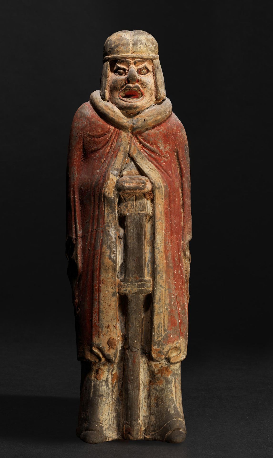 STATUETTE DE GARDIEN EN TERRE CUITE Dynastie Wei (386-550 ap. J.-C)