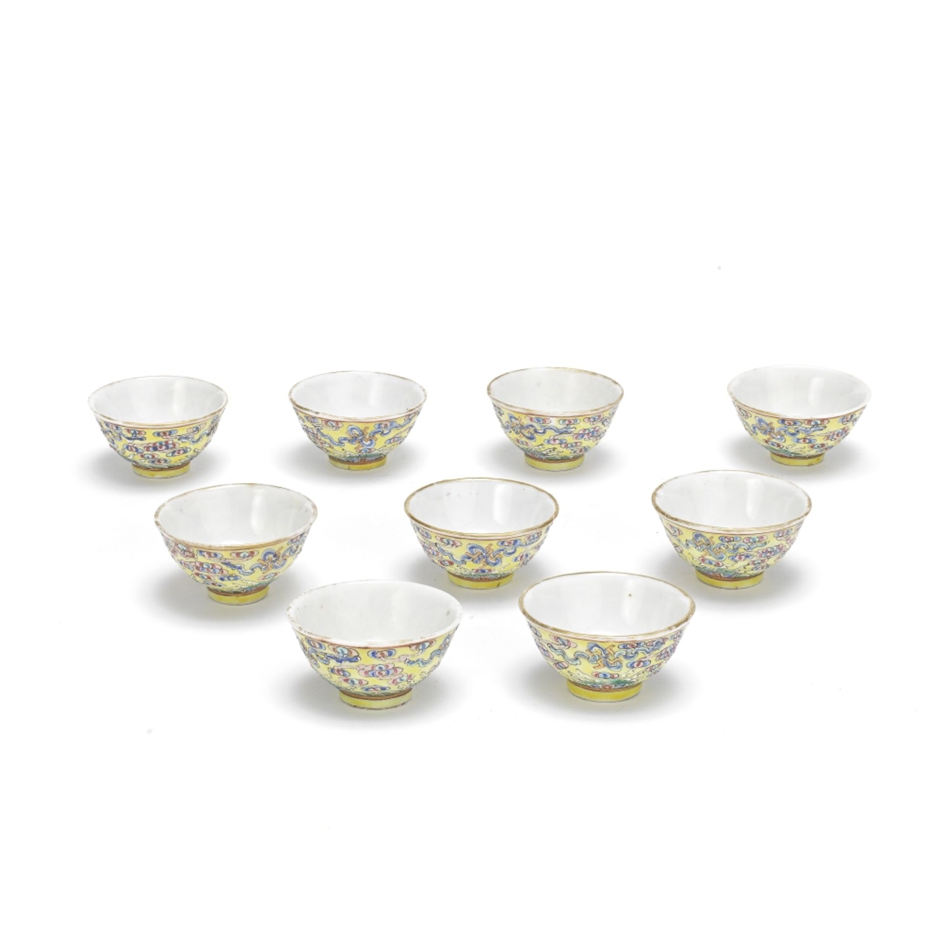 A GROUP OF NINE YELLOW GROUND WINE CUPS Guangxu six-character marks and of the period (9)