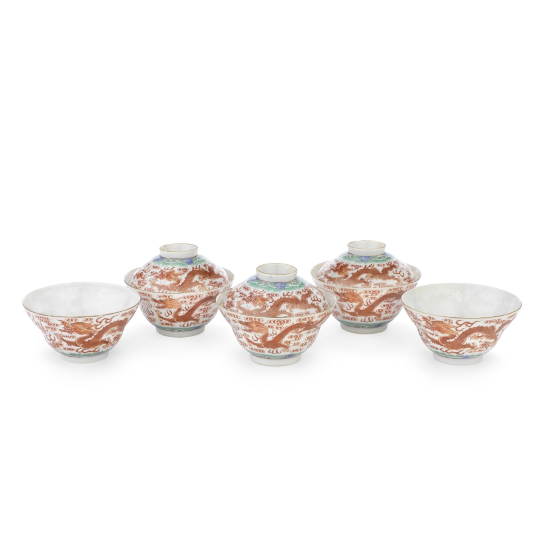 A GROUP OF FIVE IRON RED AND POLYCHROME ENAMELLED 'DRAGON' BOWLS AND THREE COVERS Jiaqing marks a...