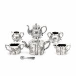 TWO DIFFERENT THREE-PIECE SILVER TEA SETS Unknown makers mark KC and GS, Canton and Hong Kong, ea...