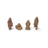 FOUR WOOD FIGURE NETSUKE Edo period (1615-1868) to Meiji era (1868-1912), 19th century (4)