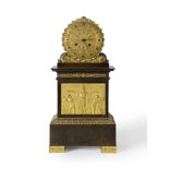 PENDULE CHARLES X EN BRONZE DORE ET BRONZE PATINE VERS 1830A CHARLES X ORMOLU AND PATINATED BRONZ...