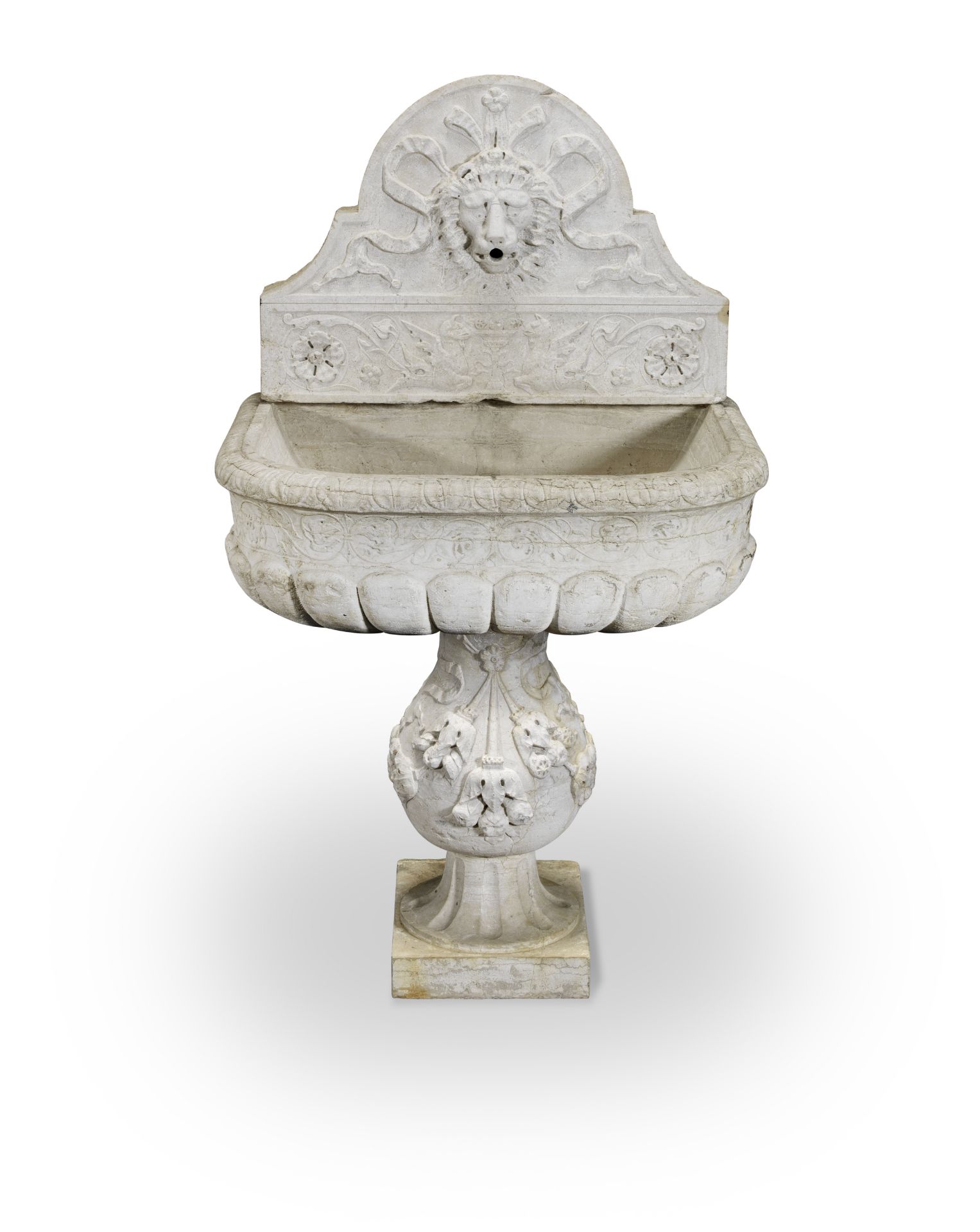 A 17th century North Italian carved Istrian stone wall fountain