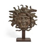 An Italian patinated bronze mask depicting the head of Medusa After the antique, probably 19th c...