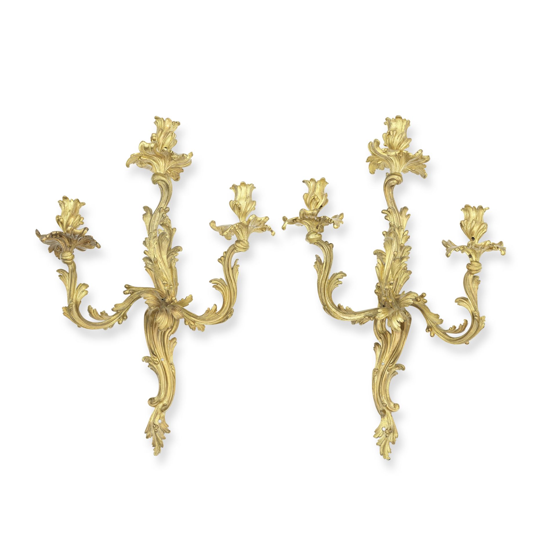 A pair of impressive French gilt bronze three light wall appliques In the Rococo taste (2)