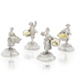A set of four Victorian silver and parcel-gilt figural salts John Samuel Hunt, London 1854, incus...