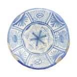 A rare and early London delftware charger, circa 1640