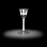 A rare Beilby enamelled opaque twist wine glass, circa 1765-70