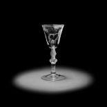 The Fattening: An exceptional Dutch stipple-engraved wine glass by Gillis Hendricus Hoolaart, cir...