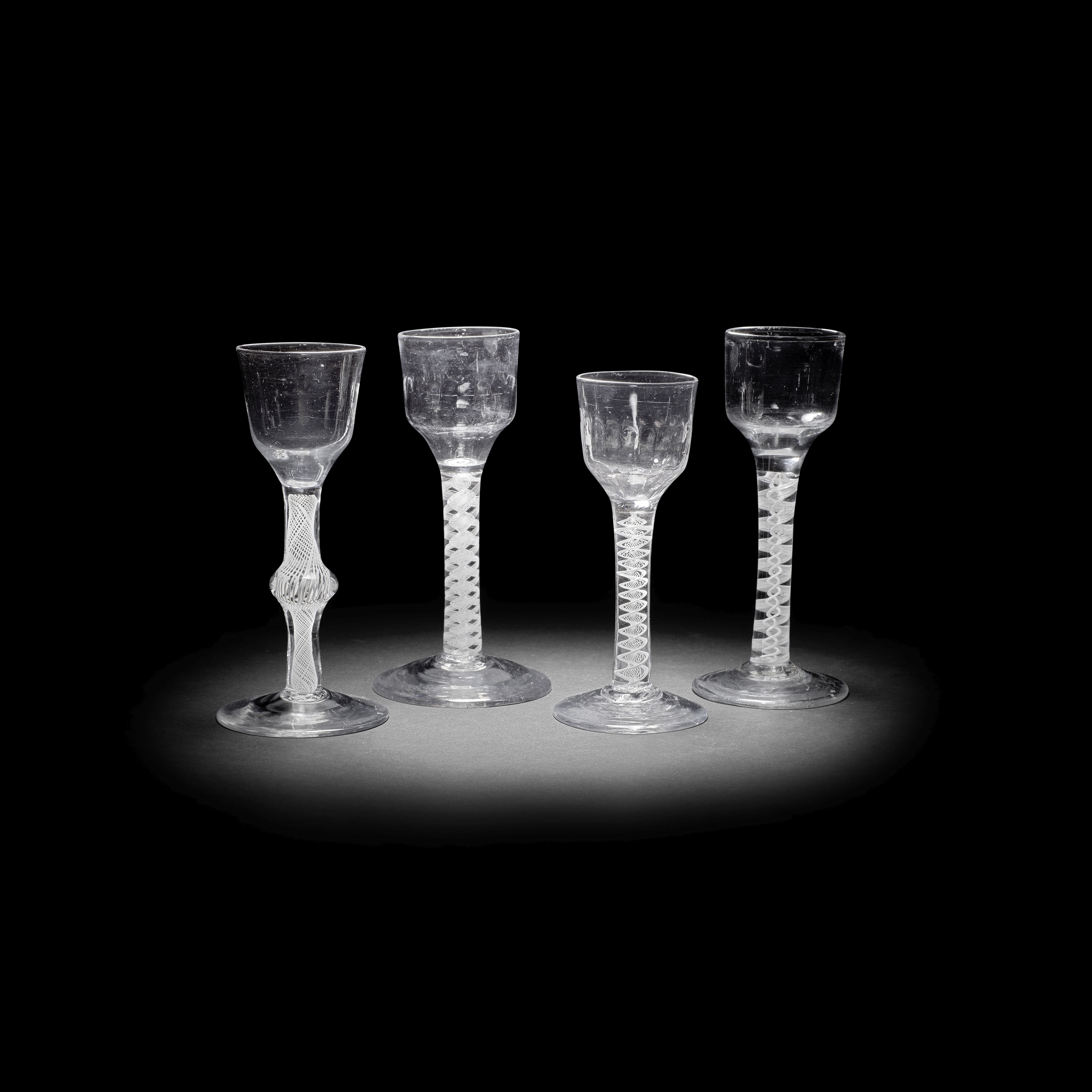 Four opaque twist wine glasses, circa 1765