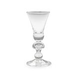 A fine heavy baluster large wine glass or goblet, circa 1710-15