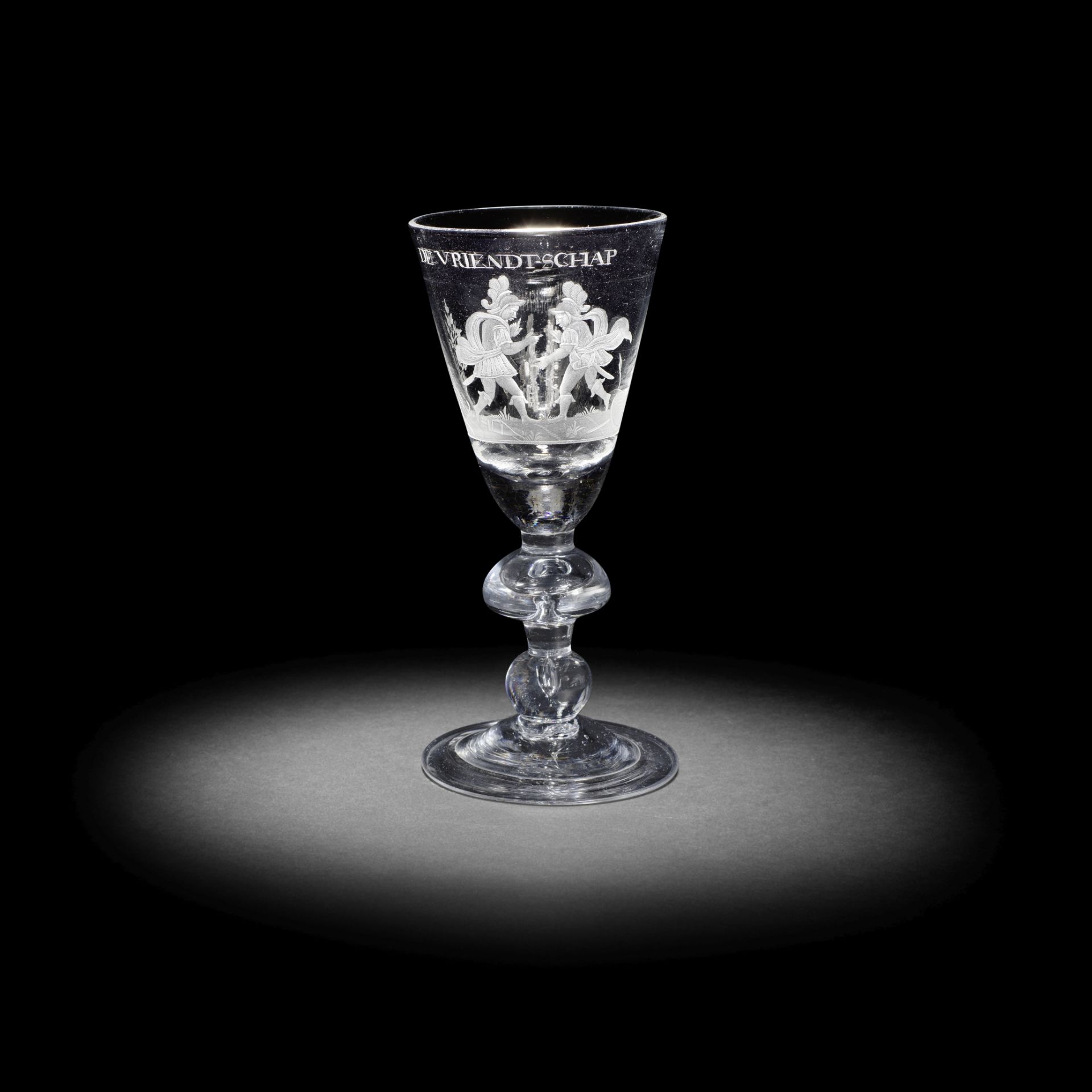 A rare Dutch engraved mushroom-knopped heavy baluster 'Friendship' goblet, circa 1710