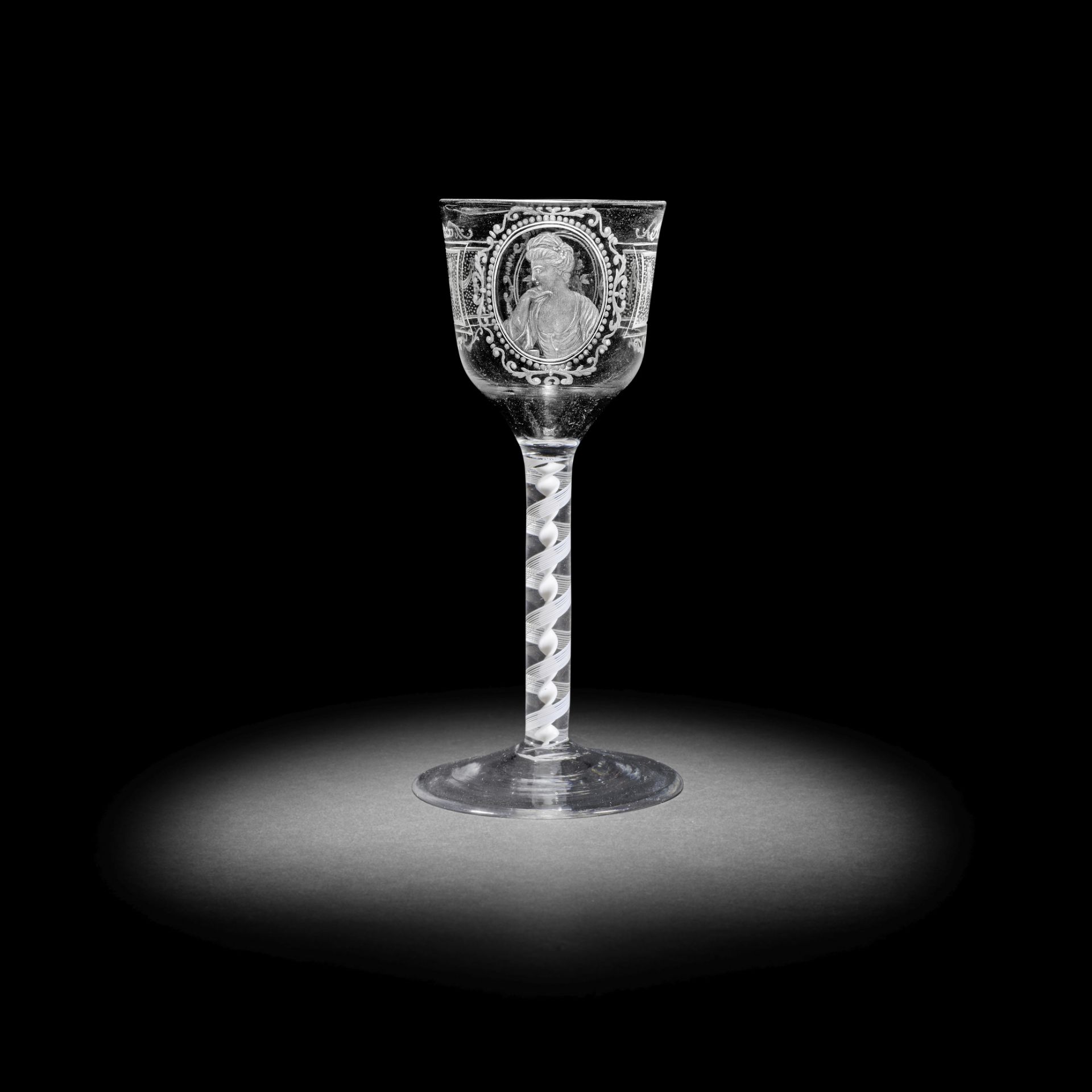 An interesting commemorative opaque twist wine glass of theatrical interest, circa 1770