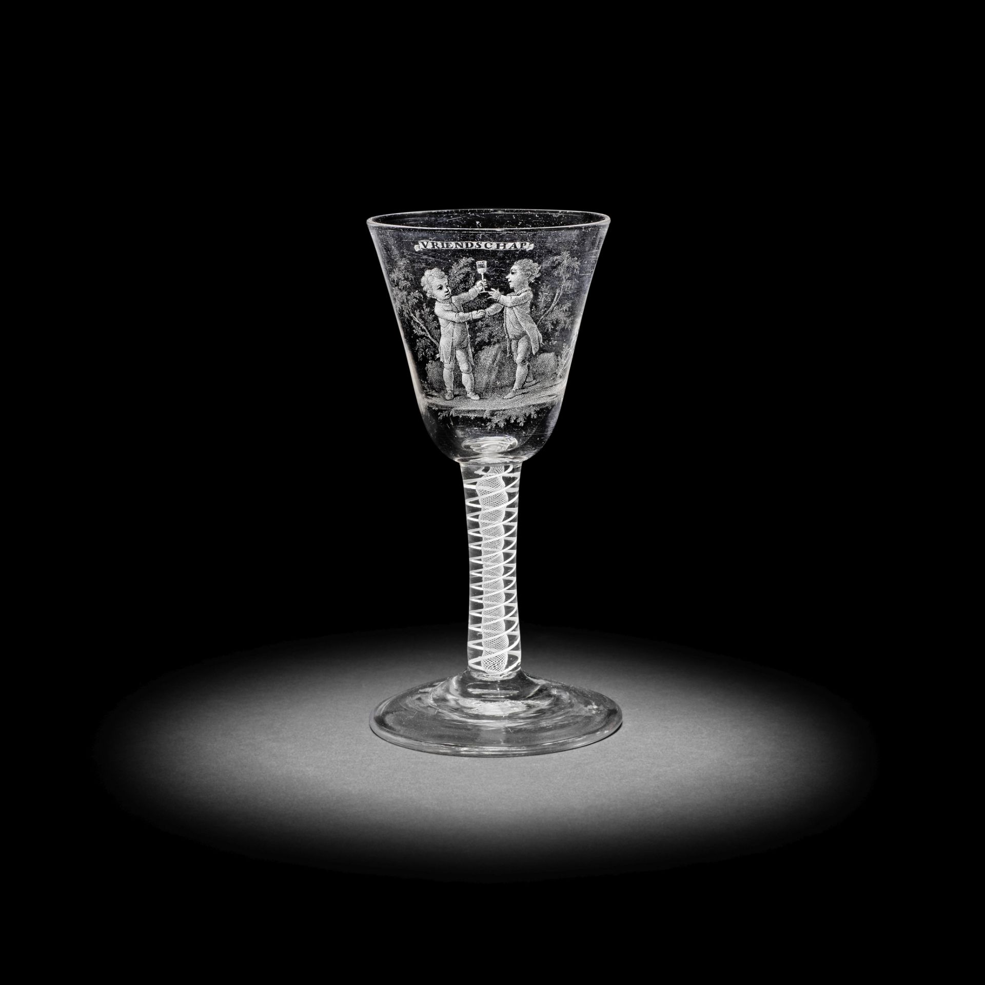 A very rare Dutch stipple-engraved opaque twist 'Friendship' glass by David Wolff, circa 1770