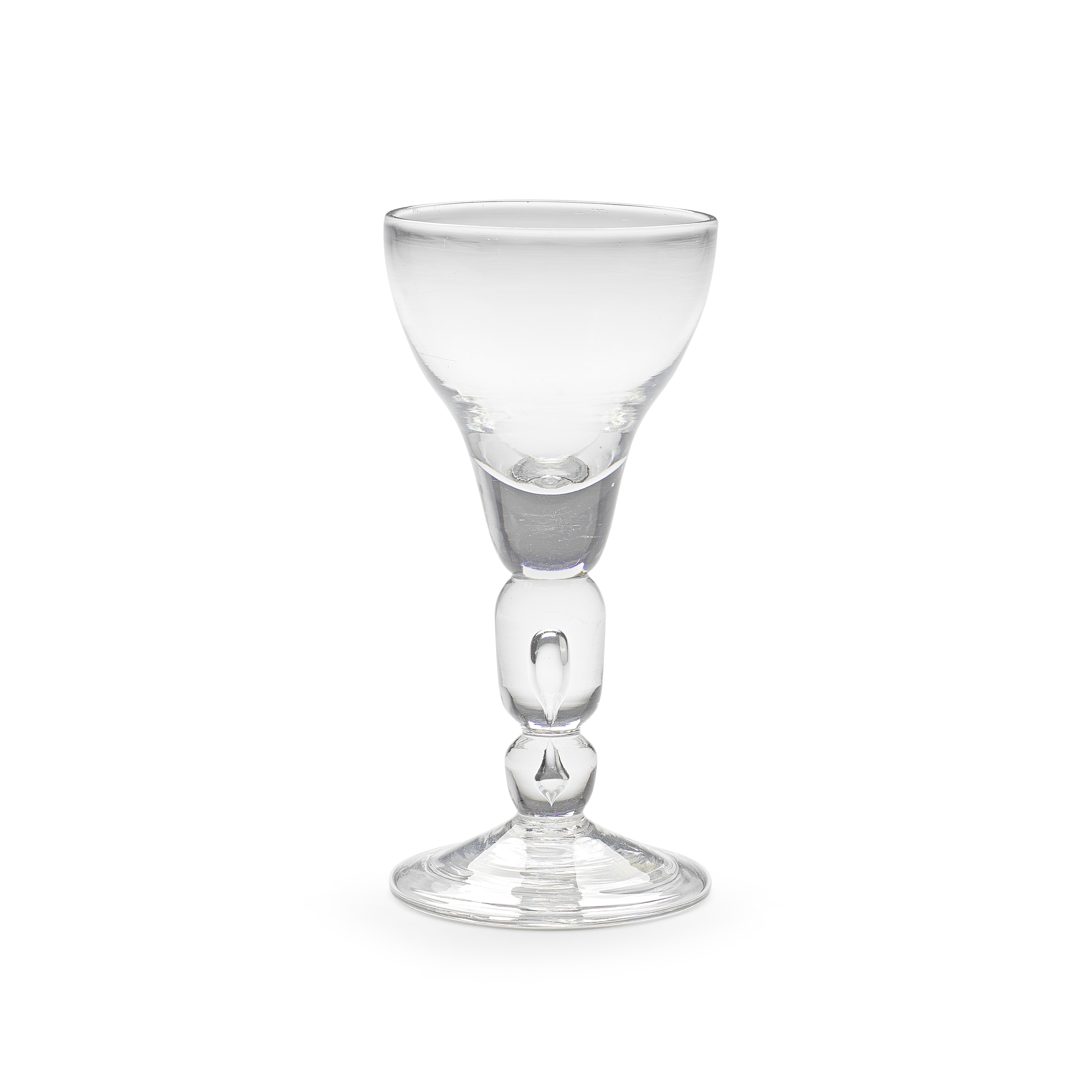 A very rare cylinder-knopped baluster wine glass, circa 1710