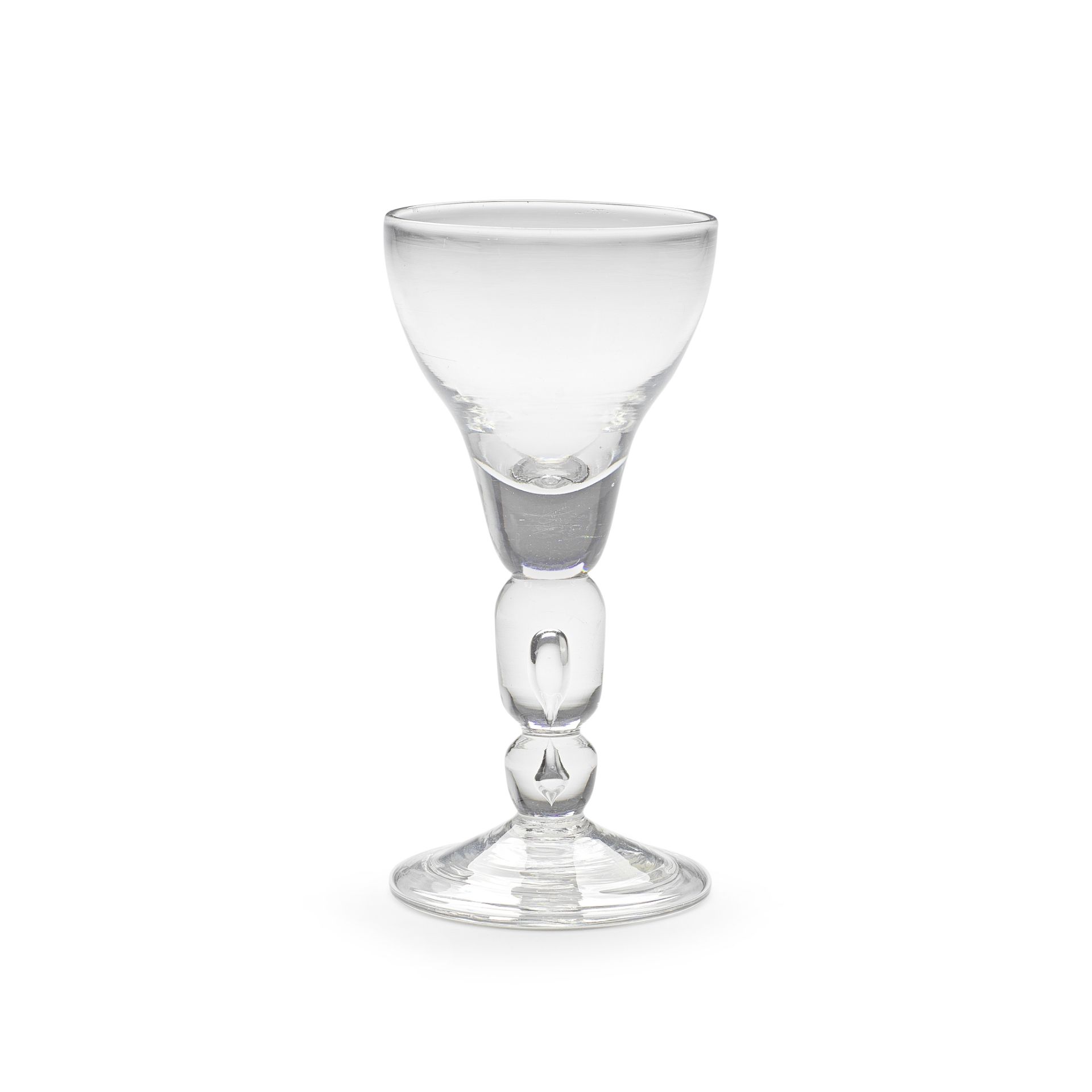 A very rare cylinder-knopped baluster wine glass, circa 1710