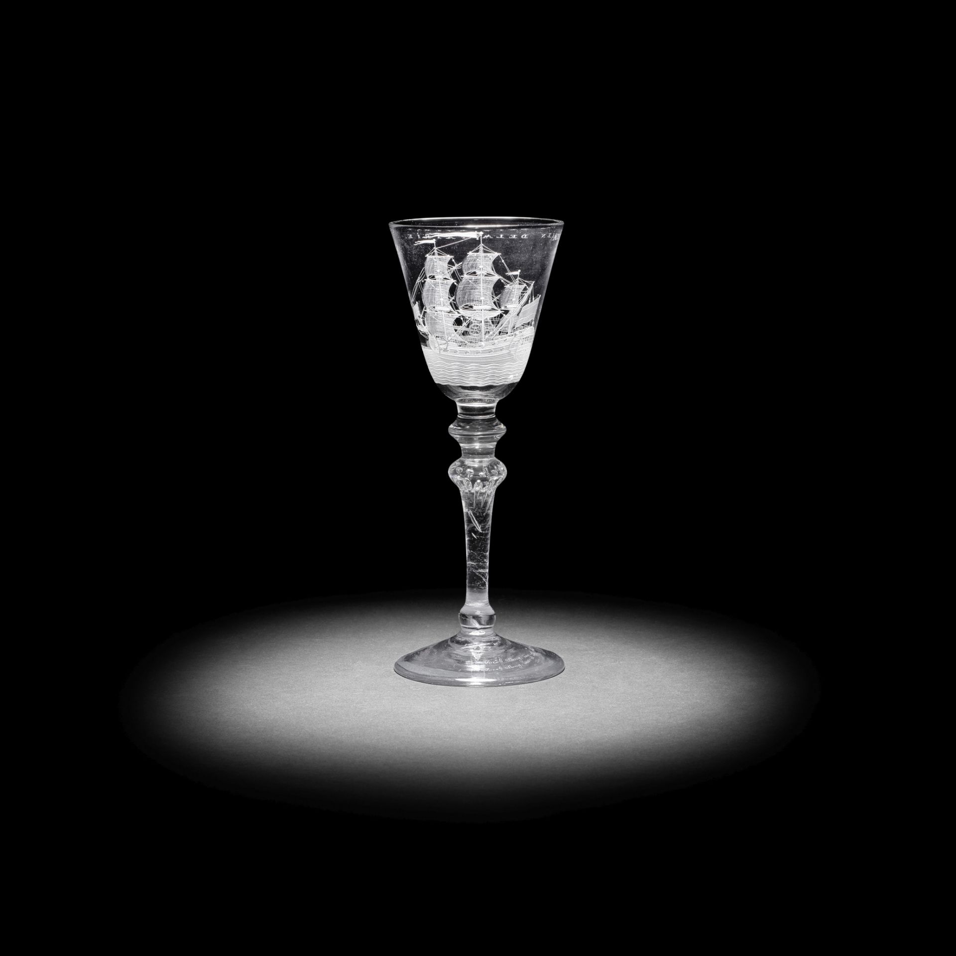 An exceptional engraved light baluster wine glass signed by Jacob Sang, dated 1760