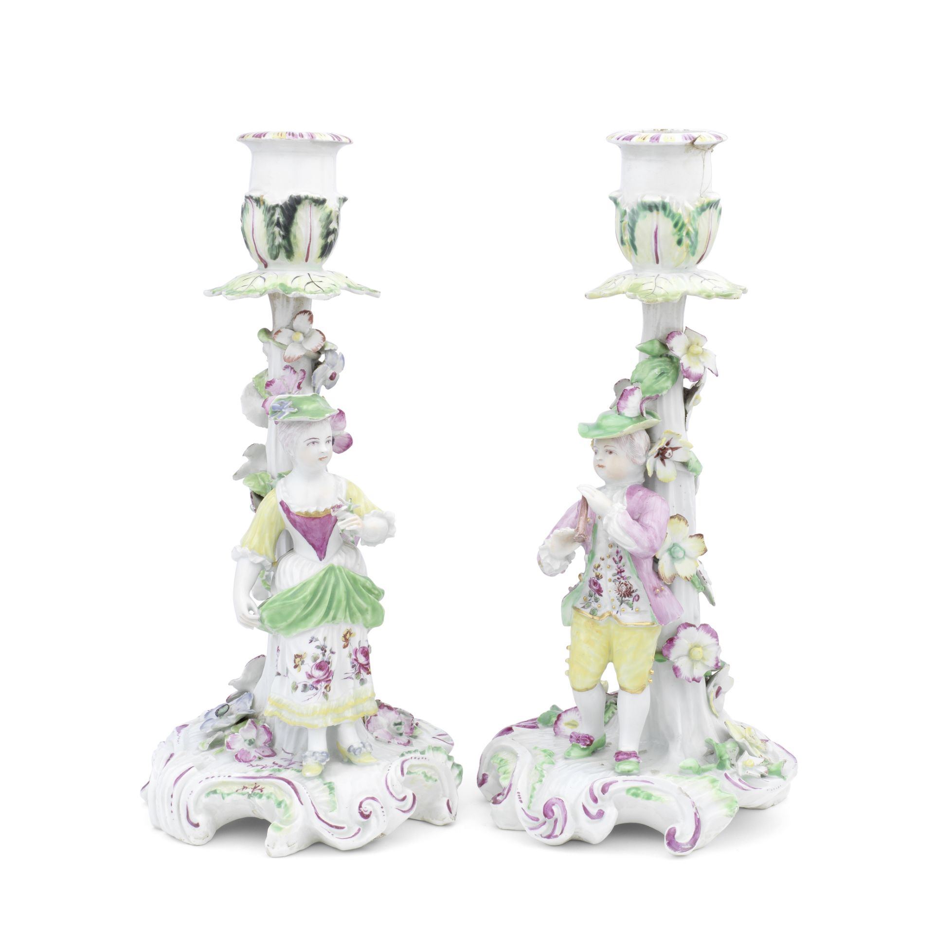A pair of Derby 'Pale Family' candlestick figures, circa 1756-58