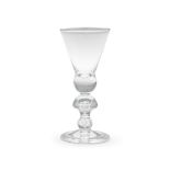 A good heavy baluster wine glass, circa 1710-15