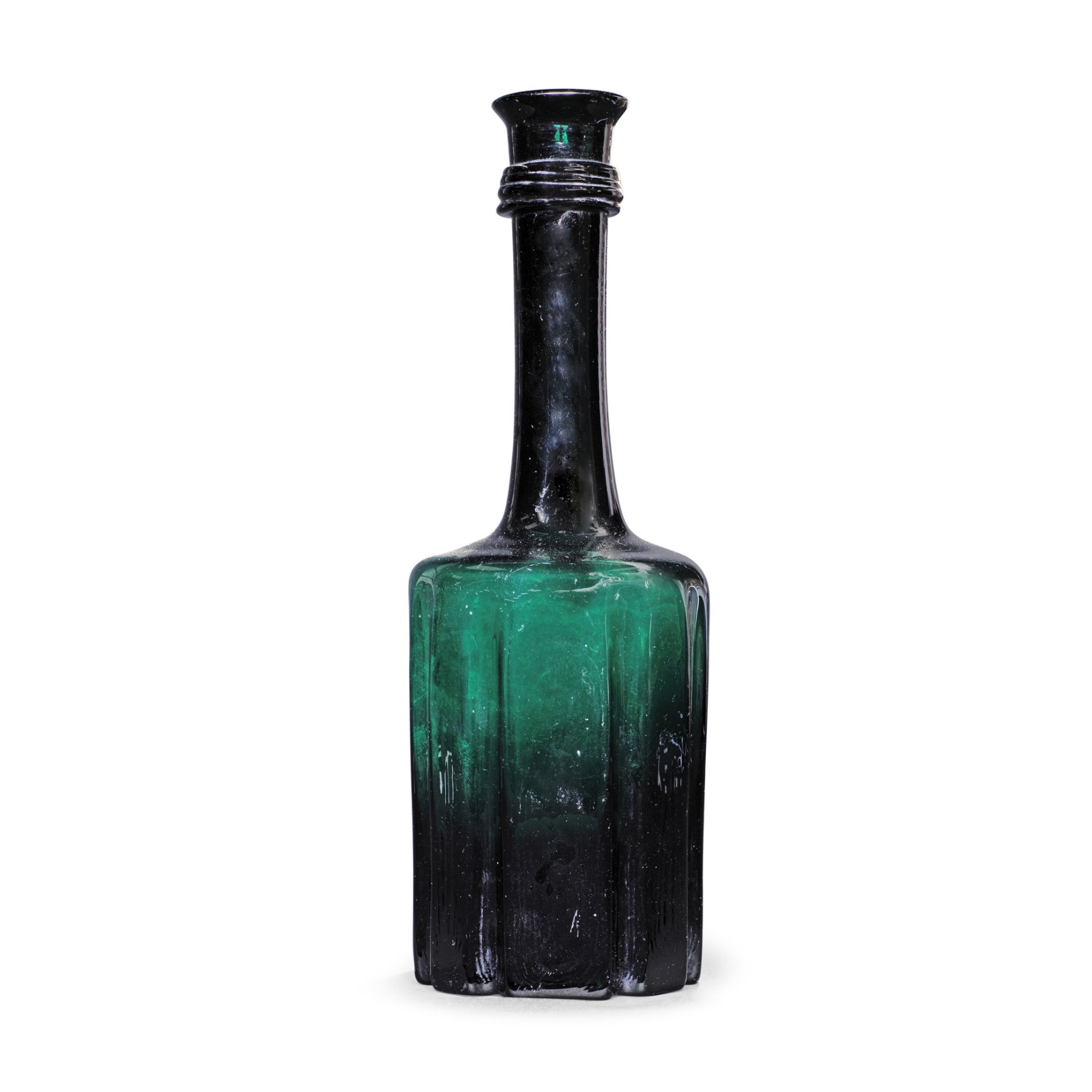 A very rare emerald-green moulded serving bottle or decanter, circa 1745