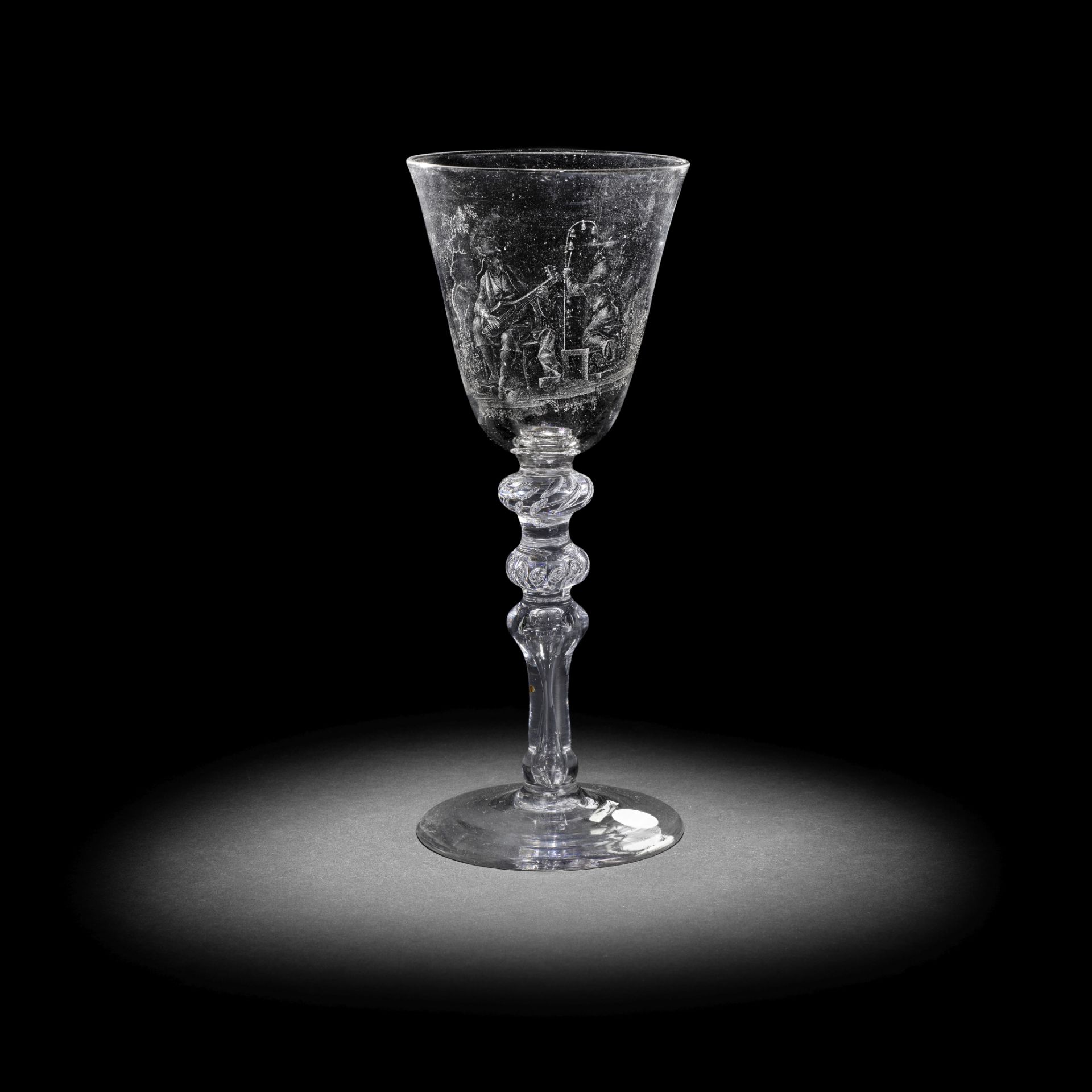 An exceptional Dutch stipple-engraved light baluster goblet by 'Alius', circa 1760-80