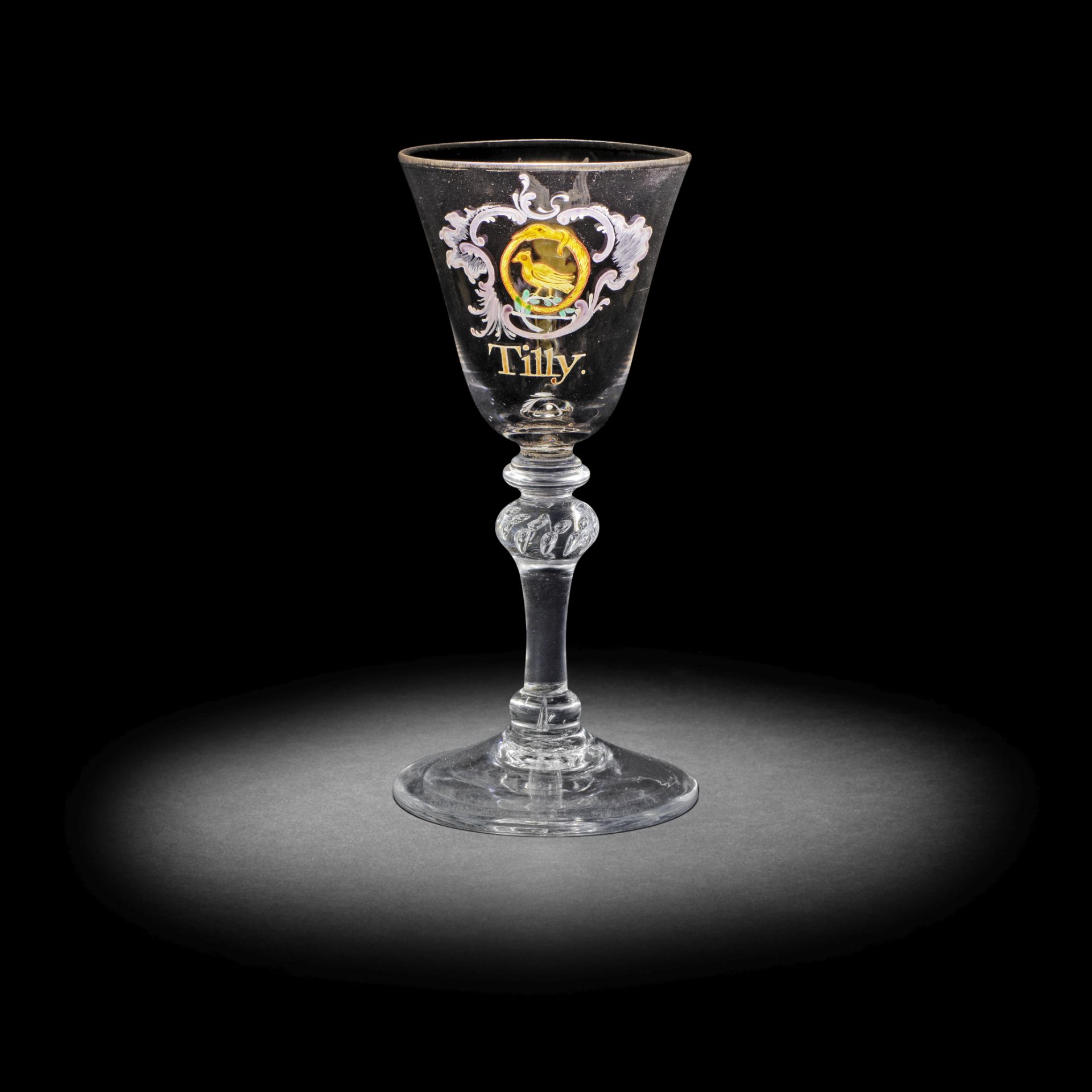 A very rare Beilby enamelled armorial light baluster 'Tilly' wine glass, circa 1765-69