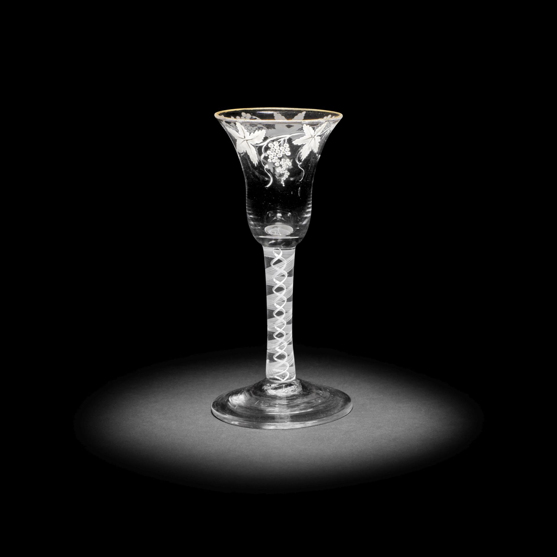 A Beilby enamelled opaque twist wine glass, circa 1765-70