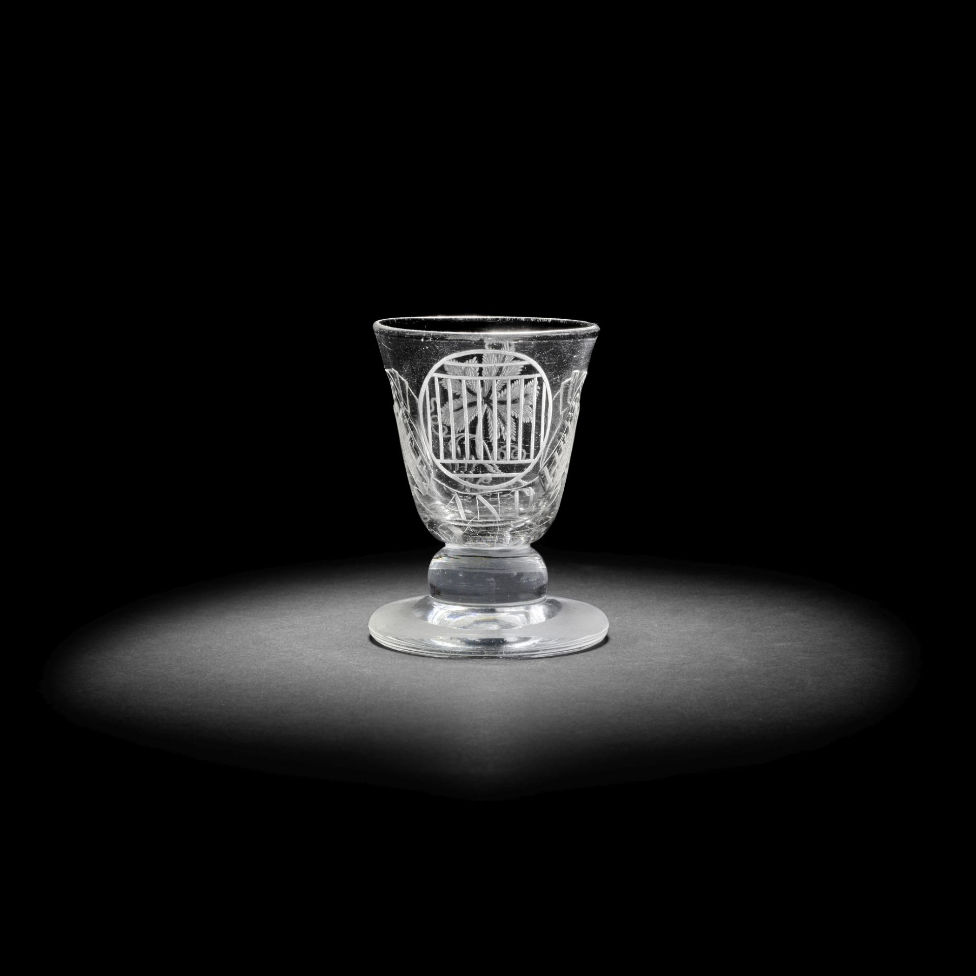 The Beefsteak Club: a rare engraved firing glass, circa 1735-45