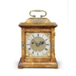 A rare miniature walnut table clock with published provenance The movement and dial by Charles Gr...