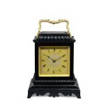 A good mid-19th century ebonised travel clock with trip repeat Arnold and Frodsham, 84 Strand Lon...