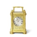 A fine and rare mid 19th century English ormolu striking travelling clock with chronometer escape...