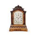 An impressive mid 19th century walnut centre seconds, quarter chiming table clock, with pull repe...