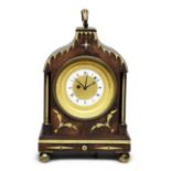 An early 19th century French Ormolu travel clock with quarter repeat and alarm, contained in a br...
