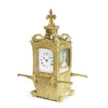 A rare late 19th/early 20th century gilt French novelty clock in the form of a Sedan Chair Maple...